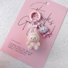 Load image into Gallery viewer, Cute Sit Flocked Mini Labubu Keychain Bag Charm With Bow