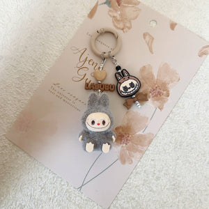 Cute Sit Flocked Mini Labubu Keychain Bag Charm With Bow
